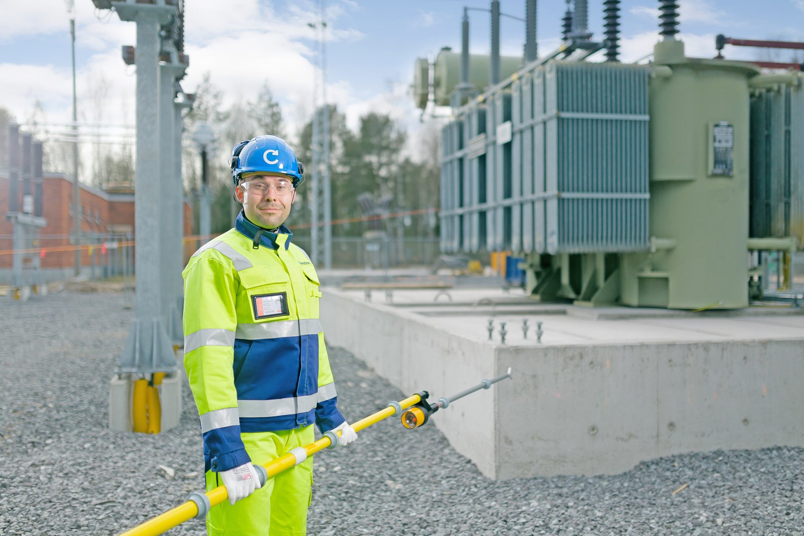 Technician outside on substation field.jpg