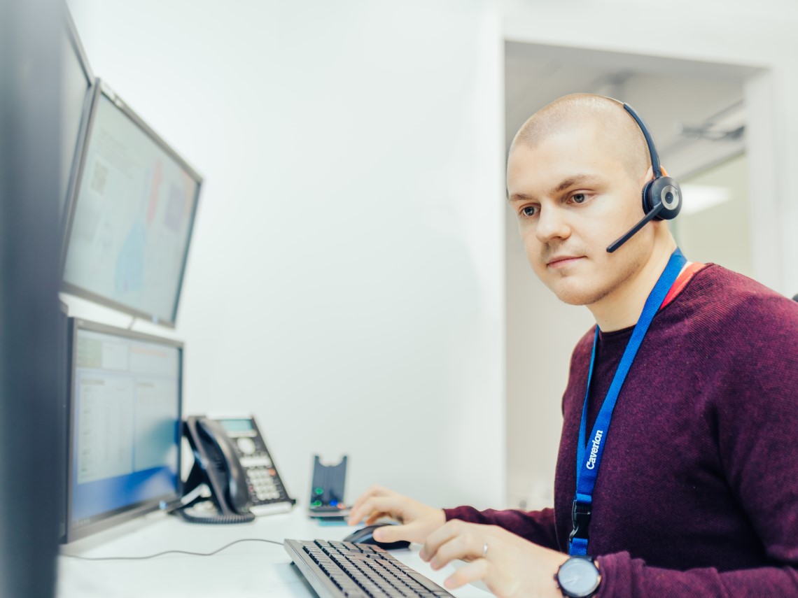 service-workers-looking-at-phone.jpg
