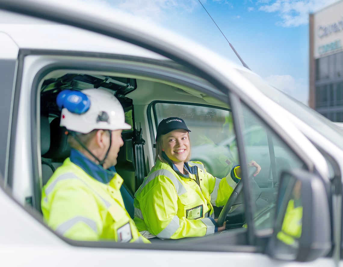 service-workers-looking-at-phone.jpg
